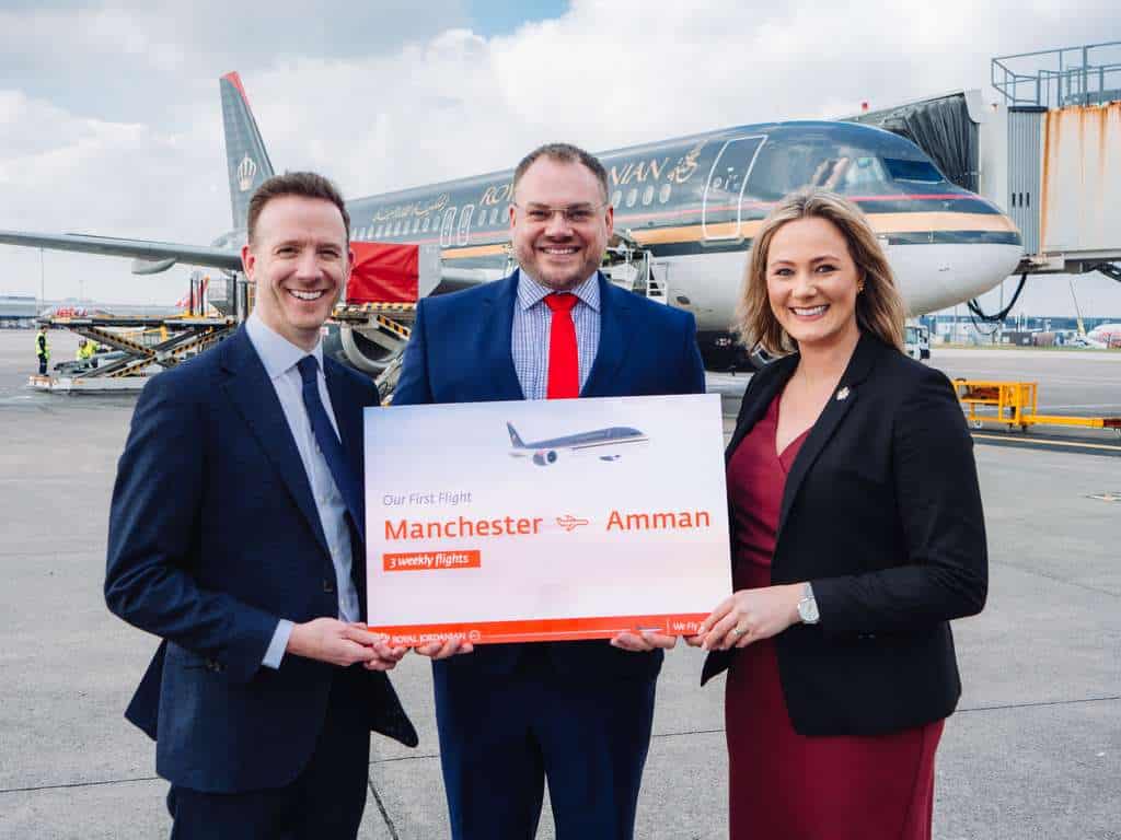 Staff of Manchester Airport and Royal Jordanian celebrate first flight to Amman.