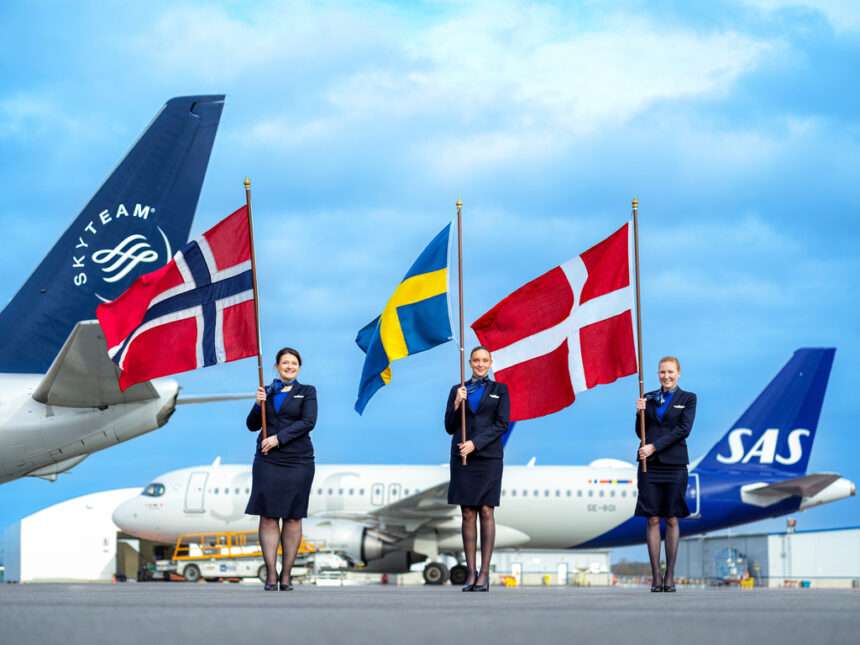 SAS flight crew with Scandinavian national flags.