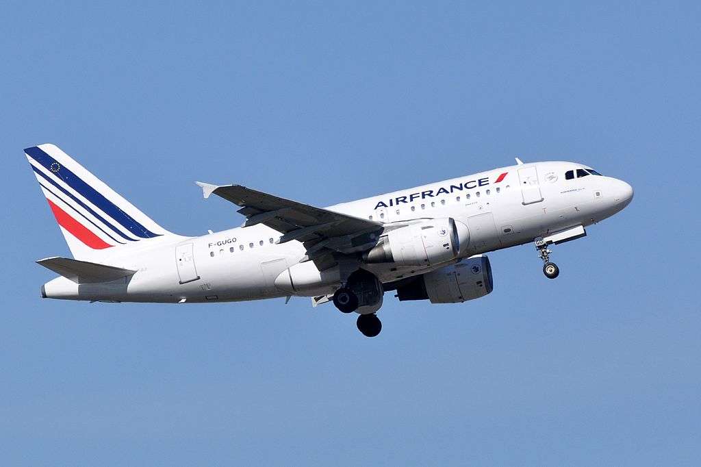 An Air France Airbus A318 climbs after takeoff.