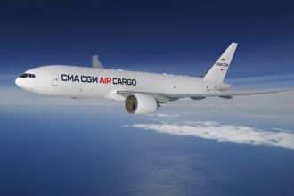 Render of a CMA CGM Air Cargo B777 freighter in flight.