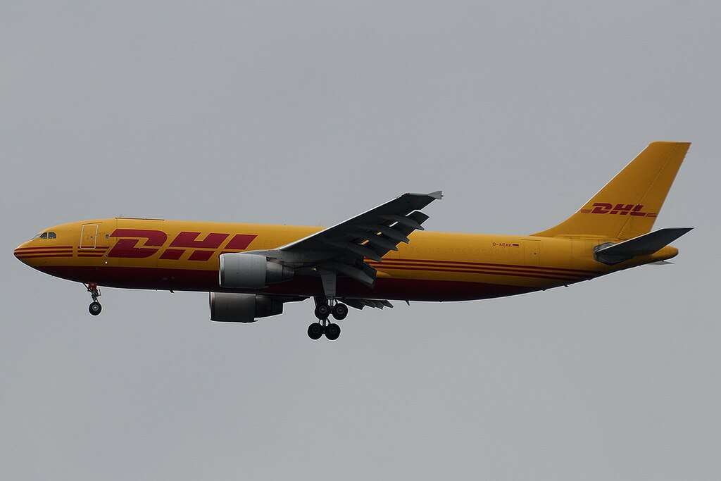 A DHL freighter in flight.