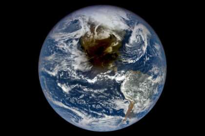 View of Earth showing North America in shadow during solar eclipse.