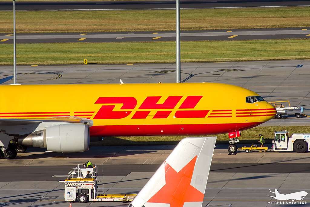 A DHL Express freighter on the ground in Melbourne.