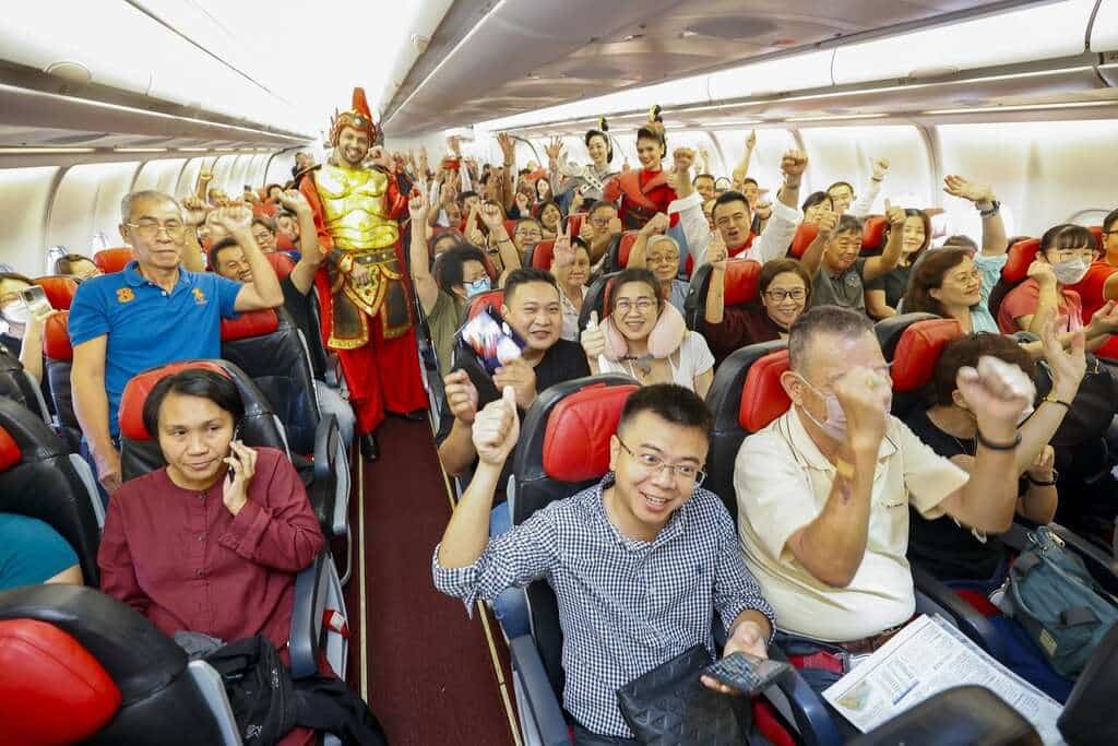 Passengers on board AirAsia X flight from Kuala Lumpur to Xi'an China.