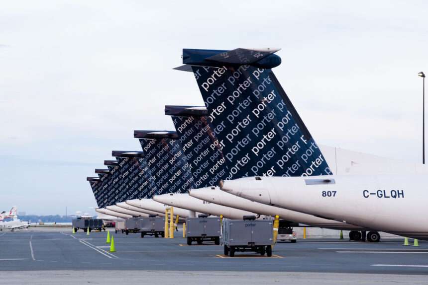 A row of Porter Airlines Dash 8 aircraft.