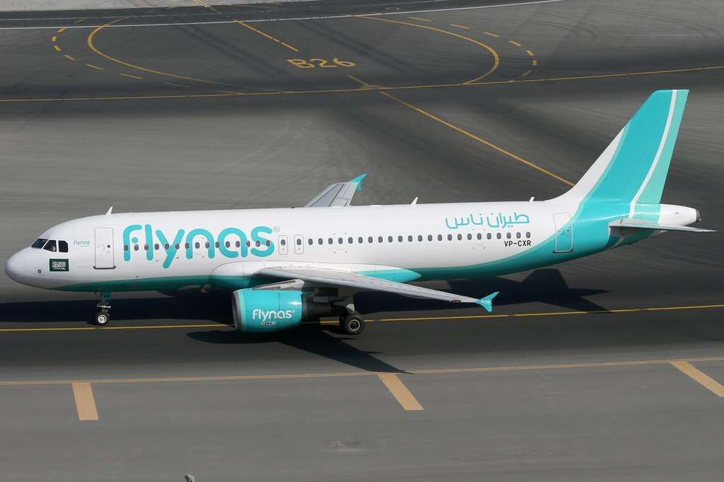A flynas A320-200 on the taxiway.