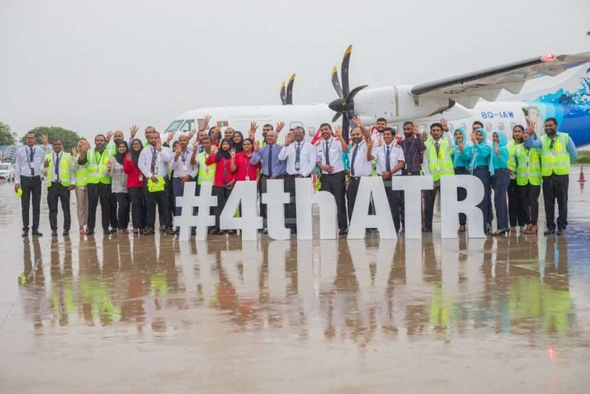 Maldivian staff with new ATR42-600 aircraft.