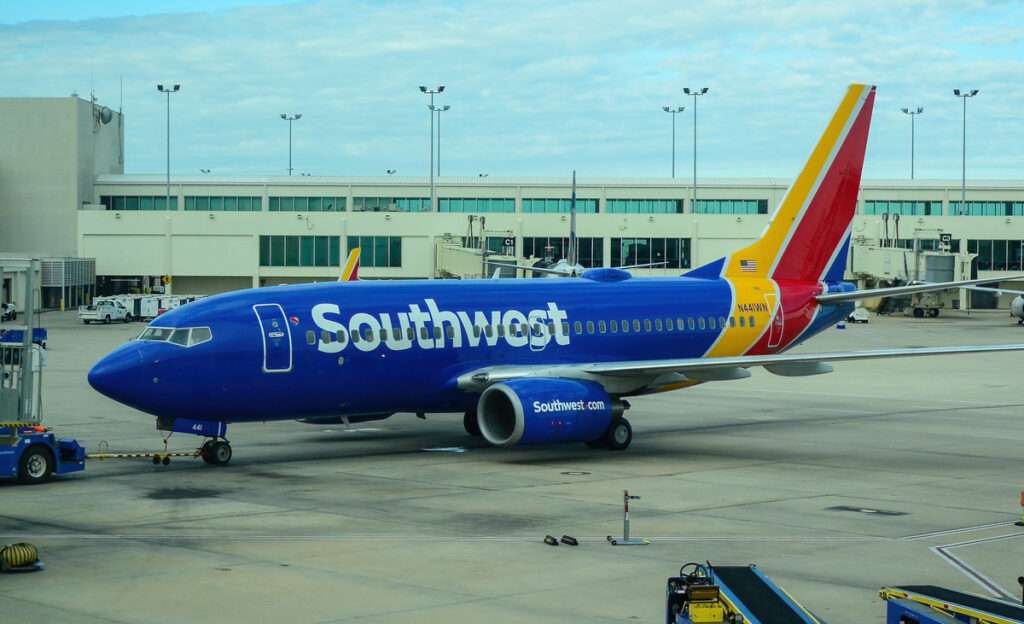 A Southwest Airlines 737 parked at the terminal.