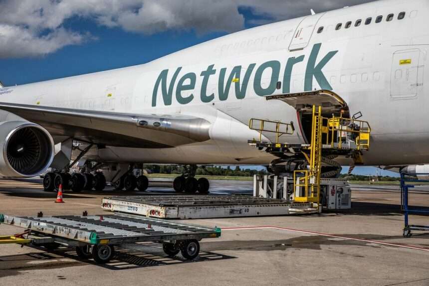 A Network Aviation Group (NAM) Boeing 747F freighter is loaded.
