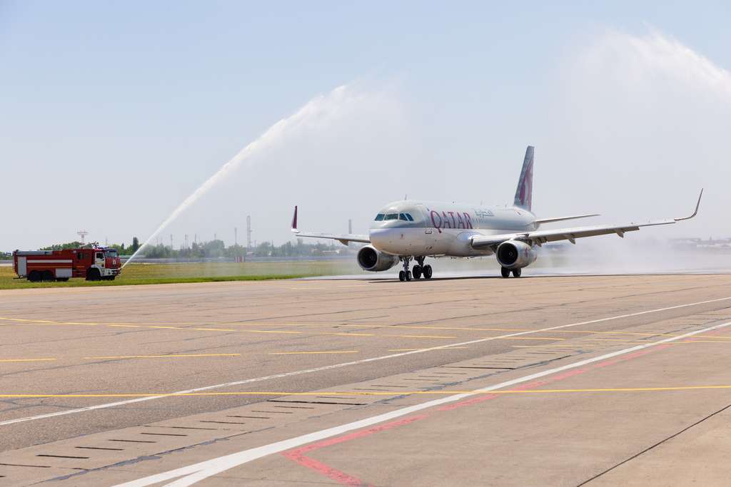 A Qatar Airways aircraft receives a water cannon salute in Tashkent