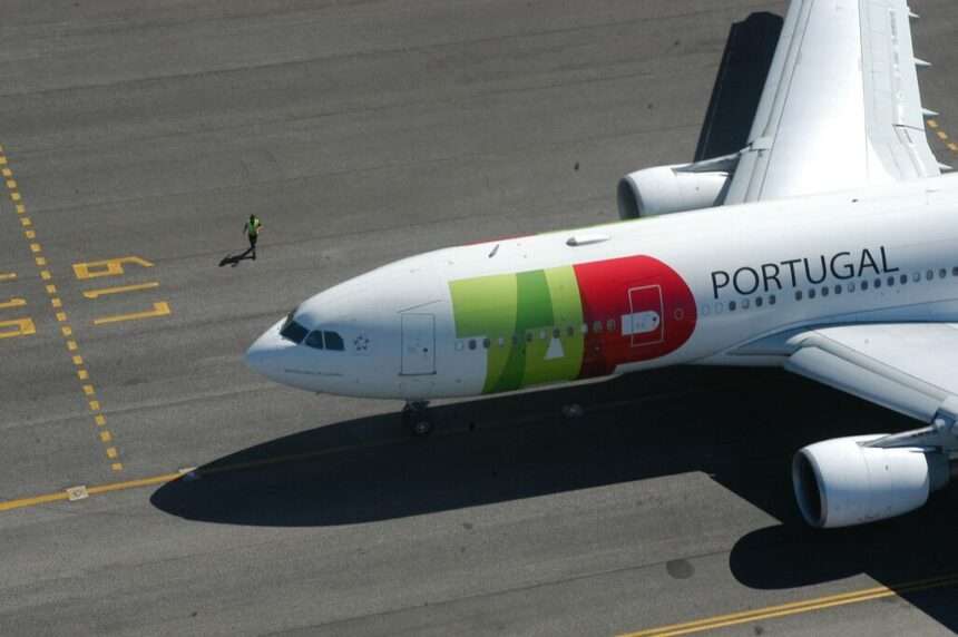 Overhand view of TAP Air Portugal A330 on runway.