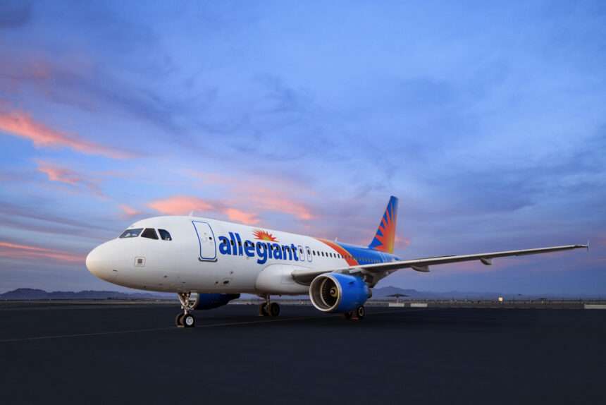 An Allegiant Airbus parked at dusk.