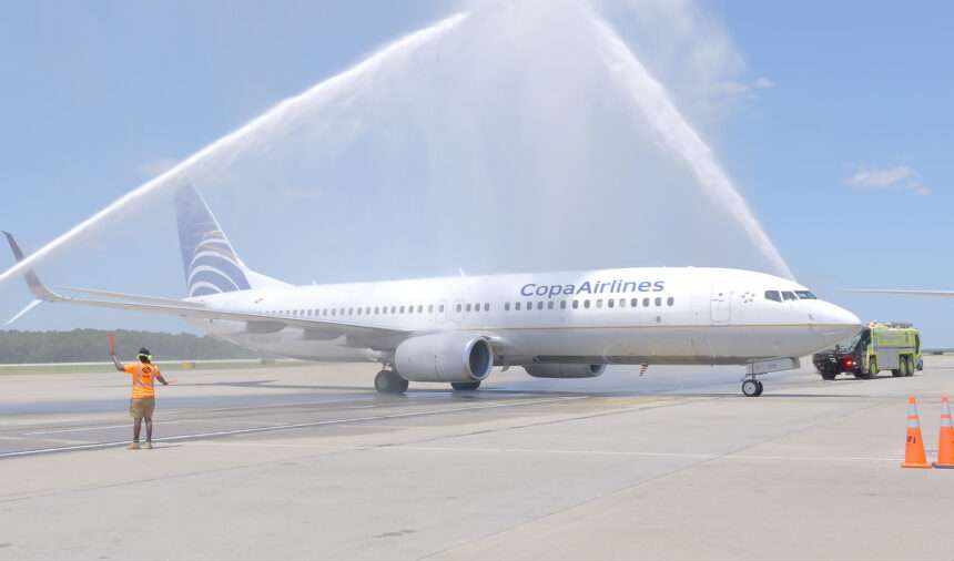 A Copa Airlines jet receives a water cannon salute at Raleigh-Durham Airport, NC.