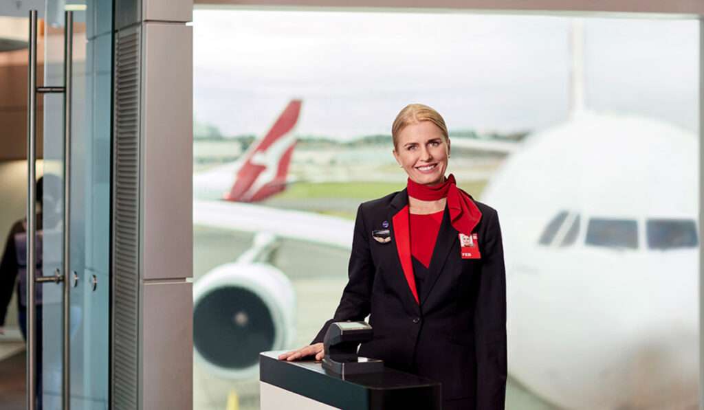 A Qantas staff member at the boarding gate.