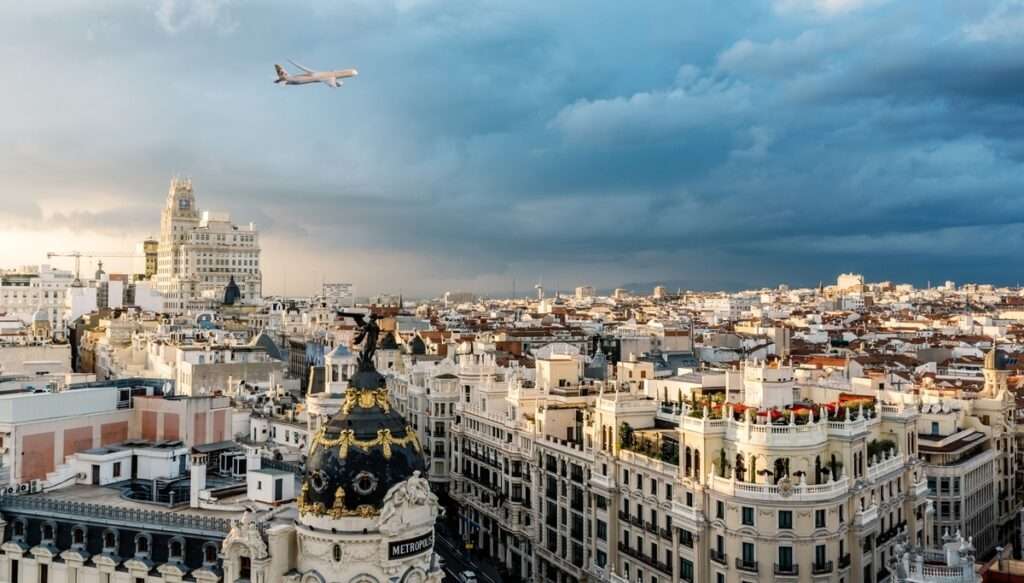 An Etihad Cargo freighter flies over Madrid.