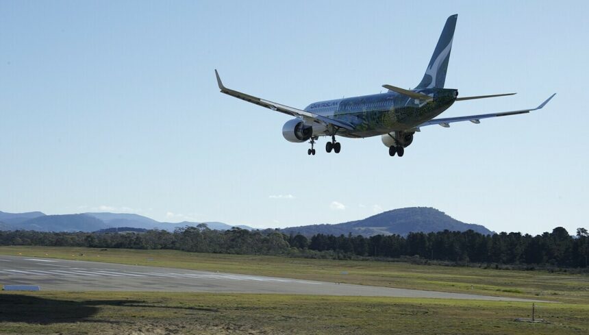 A Qantas A220 approaches to land.